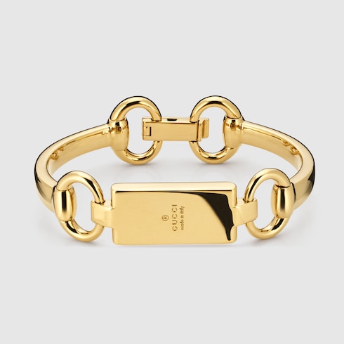 Horsebit motif bangle bracelet - gold-toned brass
