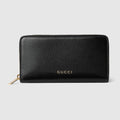 Zip around wallet with Gucci lettering - black leather