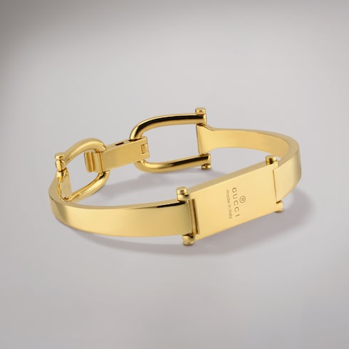 Stirrup motif bangle bracelet - gold-toned brass