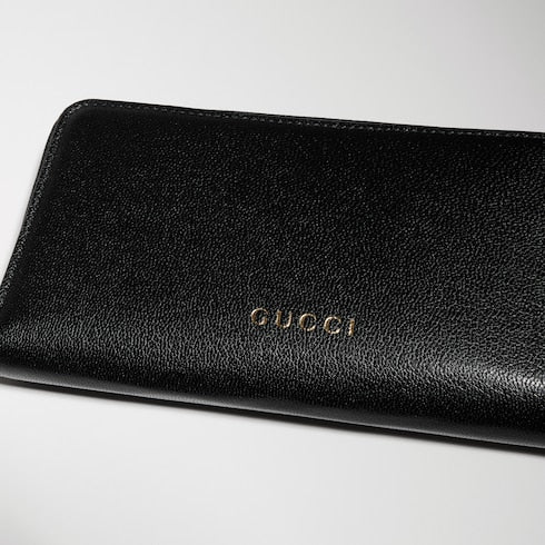 Zip around wallet with Gucci lettering - black leather
