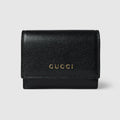 Bi-fold card case with Gucci lettering - black leather