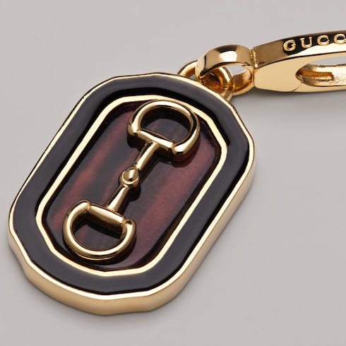 Horsebit motif charm - gold-toned brass